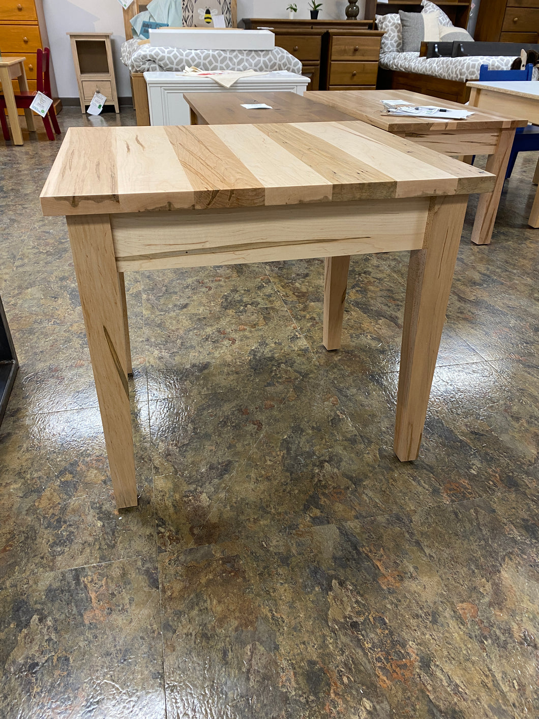 End table with tapered legs